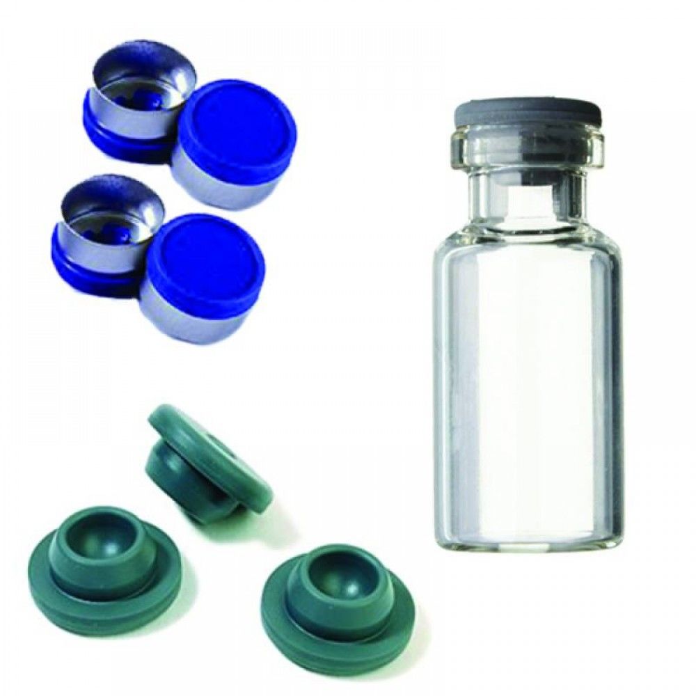 Clear glass vial with a grey stopper, shown with loose grey-green rubber stoppers and blue flip-off caps with aluminium seals